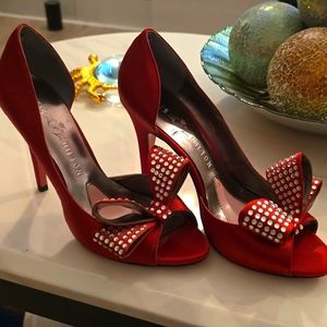 Used Red Satin w/ rhinestone bows  By Paris Hilton heels Size 7 1/2